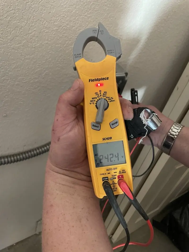 Voltage testing with clamp meter during Generator Installation in Glenarden